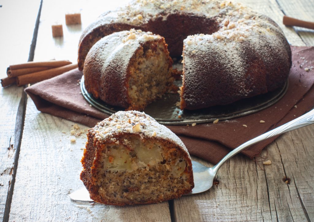 Homemade pie with nuts, poppy seeds and apples